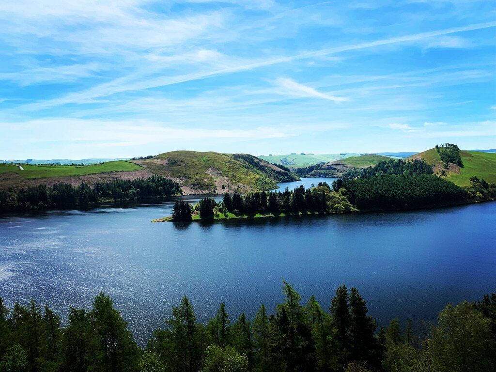 Lake and green hills scouted in Wales